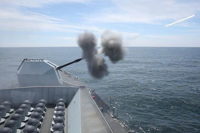 A round coming out of the 4.5 inch gun on HMS Lancaster. Photo: PO Phot Carl Osmond