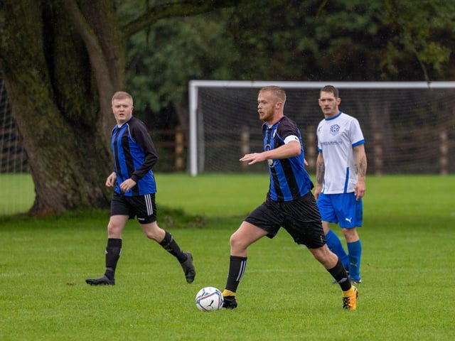 Padnell (blue) v AC Copnor Reserves. Picture by Mike Cooter