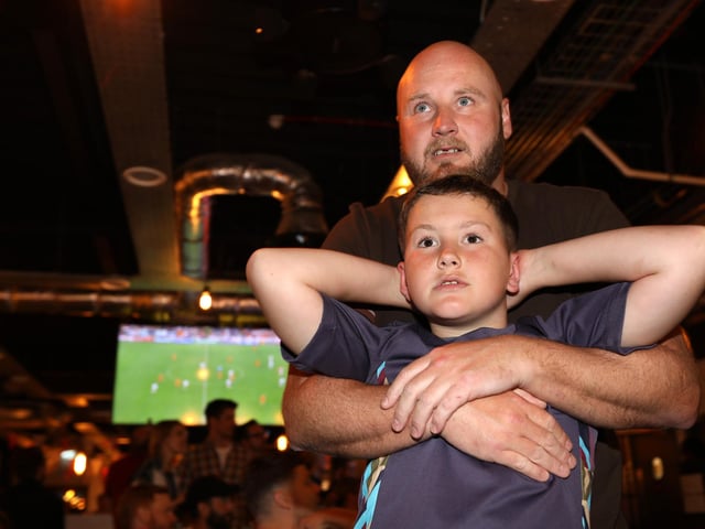 Celebrations at full-time. Fans watch Netherlands v England, UEFA Euros 2024 semi-final played in Dortmund, at Village Hotel, Lakeshore Drive, CoshamPicture: Chris  Moorhouse (100724-101)
