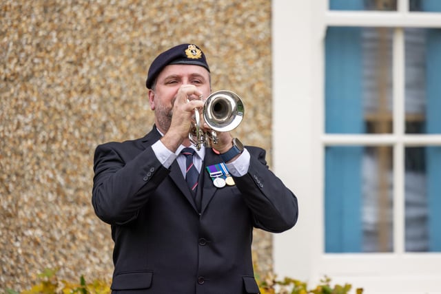 Bugler playing the last post at the service in Gosport. Picture: Mike Cooter (121123)