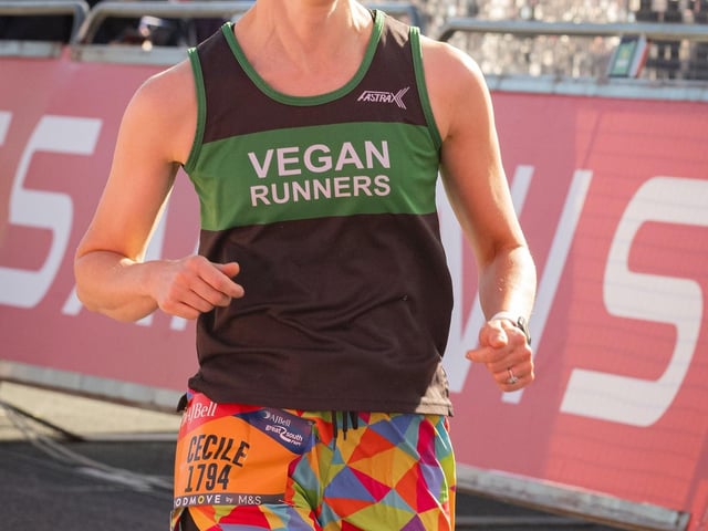 Pictured is:  Runners cross the line to finishPicture: Keith Woodland (151021-721)
