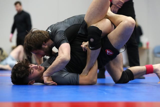 Bradley Fry, top, competing in a Brazilian Jiu Jitsu competition at the Ravelin Centre in Portsmouth. Picture: Chris Moorhouse (jpns 250223-03)