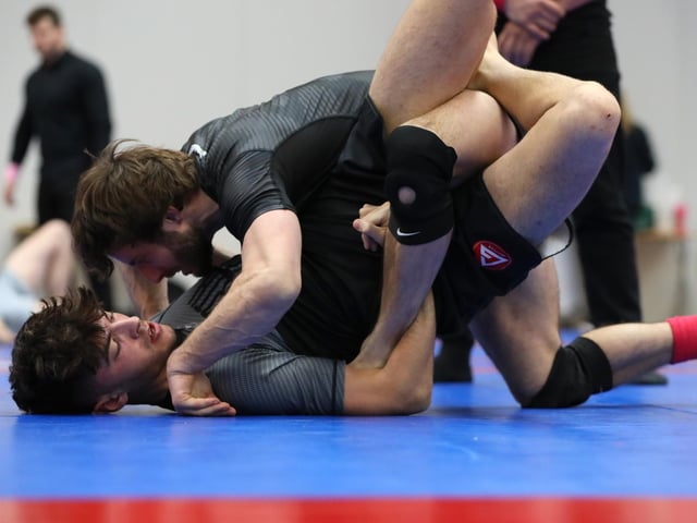 Bradley Fry, top, competing in a Brazilian Jiu Jitsu competition at the Ravelin Centre in Portsmouth. Picture: Chris Moorhouse (jpns 250223-03)
