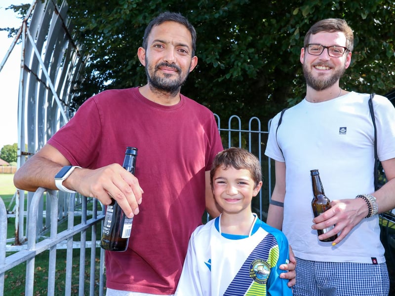 Football fans Philip Bull, left, and Shane Howard with Philip's son, Daniel, 7, who was one of the mascots for Saturday's fixture at Gosport Borough FC.
Picture: Chris Moorhouse (jpns 090923-17)