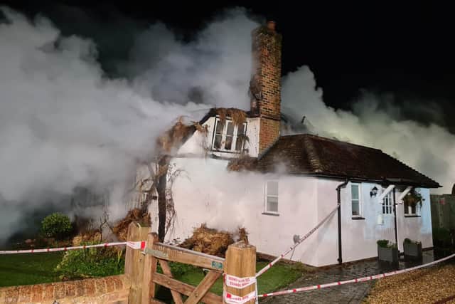 More than 70 firefighters have spent hours fighting a fire across a thatched-roof property in Clanfield. Picture: Hampshire fire service