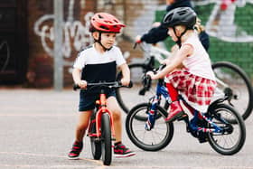 Children learning to ride at Buckland Community Day (26 July, 2025)