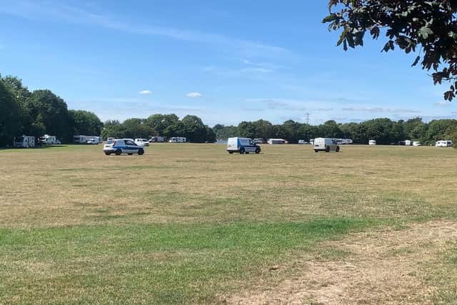 A trio of council vehicles arrive at Wicor Recreation Ground in Cranleigh Road, Portchester, today, where an unlawful encampment has been set up. Picture: Sarah Standing