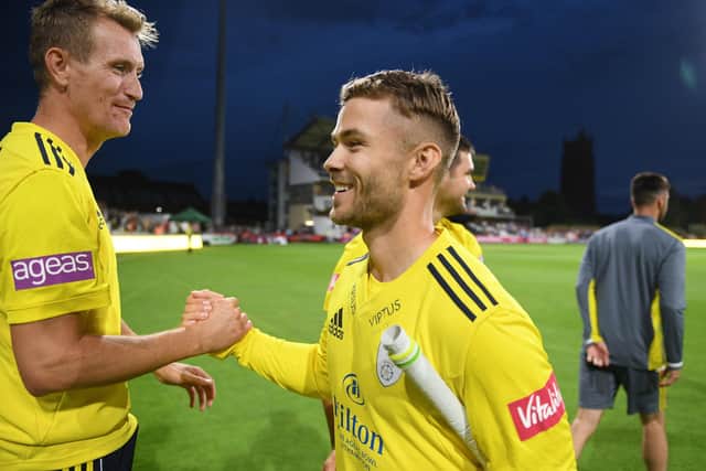 Chris Morris and Lewis McManus celebrate Hampshire's T20 Blast win against Somerset at Taunton last summer. Photo by Harry Trump/Getty Images.