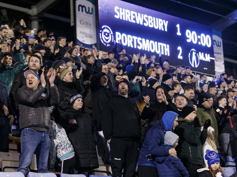 Pompey fans celebrate Louis Thompson's 84th-minute winner in the Blues' 2-1 win at Shrewsbury on February 2022.