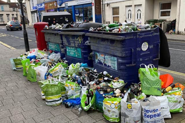 Overflowing glass recycling banks in Fawcett Road, Southsea, as Portsmouth City Council warned it collected an unprecedented amount of glass over the festive period in December 2020. Picture: George Fielding