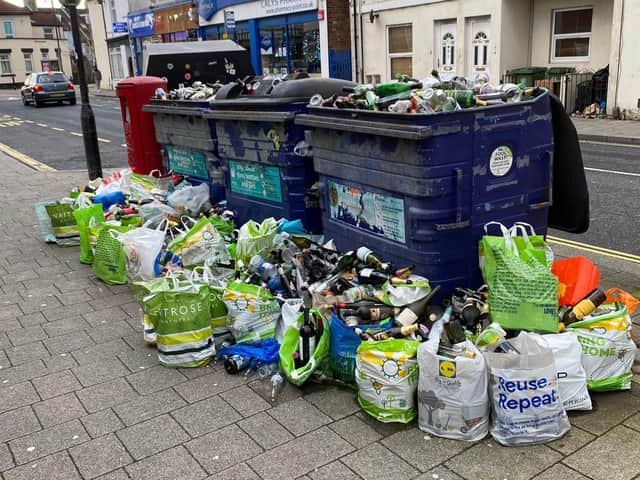 Overflowing glass recycling banks in Fawcett Road, Southsea, as Portsmouth City Council warned it collected an unprecedented amount of glass over the festive period in December 2020. Picture: George Fielding
