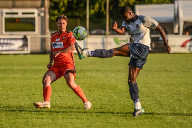 Joe Briggs, left, in action for Portchester during last night's friendly victory over Folland. Picture: Daniel Haswell