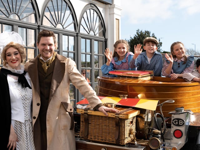 Pictured is: Caractacus Potts with Truly Scrumptious and the children from the play.
