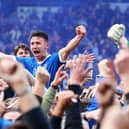 Enda Stevens celebrates winning the League Two title at Fratton Park against Cheltenham in May 2017. Picture: Joe Pepler/Digital South.