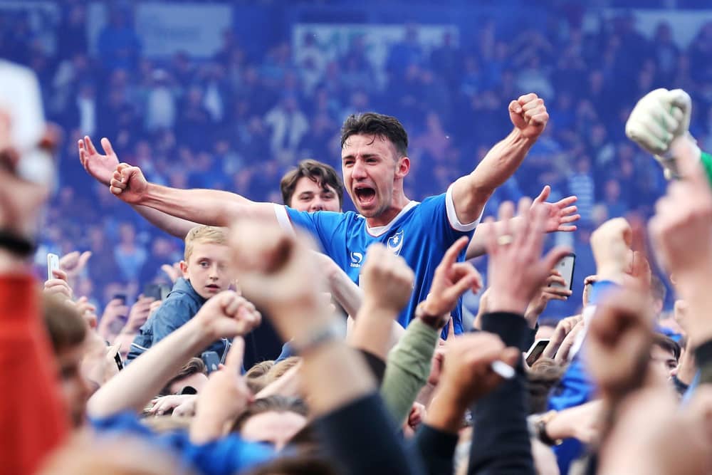 Enda Stevens celebrates winning the League Two title at Fratton Park against Cheltenham in May 2017. Picture: Joe Pepler/Digital South.