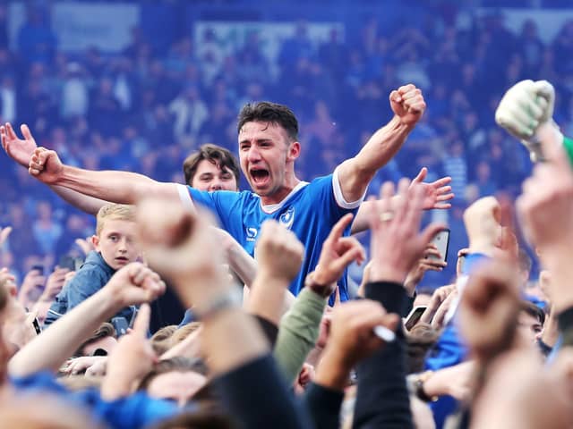 Enda Stevens celebrates winning the League Two title at Fratton Park against Cheltenham in May 2017. Picture: Joe Pepler/Digital South.