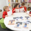 From left, Marryn Burrows (8), Arnie Gransden (10), Adam Norgate (11) and Avril Hanton (9), with letters sent by Kitoo Primary School. Picture: Sarah Standing (160320-7360)