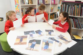 From left, Marryn Burrows (8), Arnie Gransden (10), Adam Norgate (11) and Avril Hanton (9), with letters sent by Kitoo Primary School. Picture: Sarah Standing (160320-7360)