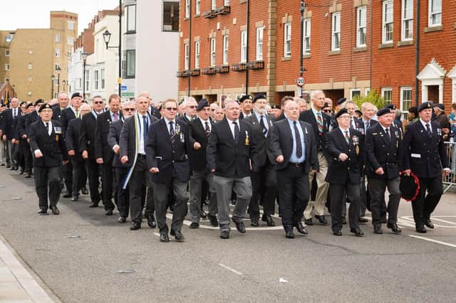 Veterans marching through Old Portsmouth. Picture: Keith Woodland (190621-124).