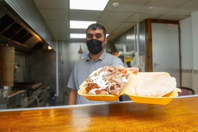 Ibrahim Ulucan with a kebab at Copnor Grill, Portsmouth.
Picture: Habibur Rahman