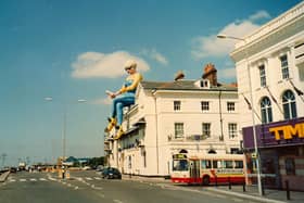A giant balloon in the shape of a woman, sits on the roof above Bar Bluu in South Parade in 1999. Picture: Courtesy of Doreen Gallacher. If anyone can remember the reason for her being there please let us know.