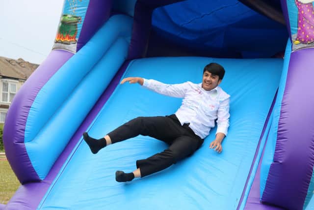 Year 11 student enjoys the bouncy castle. 