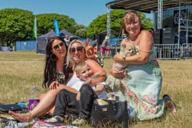 Enjoying the show at the Bandstand. Pictured: Amie Johnson (37), Carmel Dixon (32), Oscar Pearce (8), Christine Hemms (57) and dog Lola. Picture: Mike Cooter (240623)