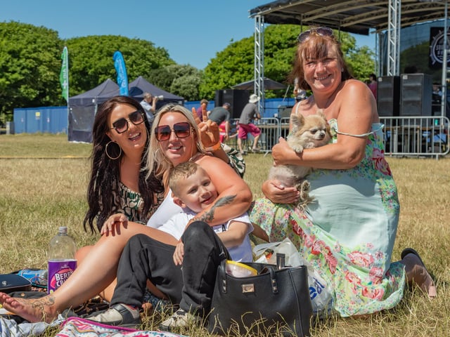 Enjoying the show at the Bandstand. Pictured: Amie Johnson (37), Carmel Dixon (32), Oscar Pearce (8), Christine Hemms (57) and dog Lola. Picture: Mike Cooter (240623)