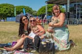 Enjoying the show at the Bandstand. Pictured: Amie Johnson (37), Carmel Dixon (32), Oscar Pearce (8), Christine Hemms (57) and dog Lola. Picture: Mike Cooter (240623)