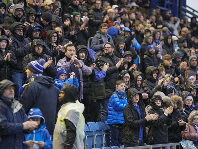 Pompey fans braved terrible weather conditions on New Year's Day to cheer the Blues to victory against Swansea.