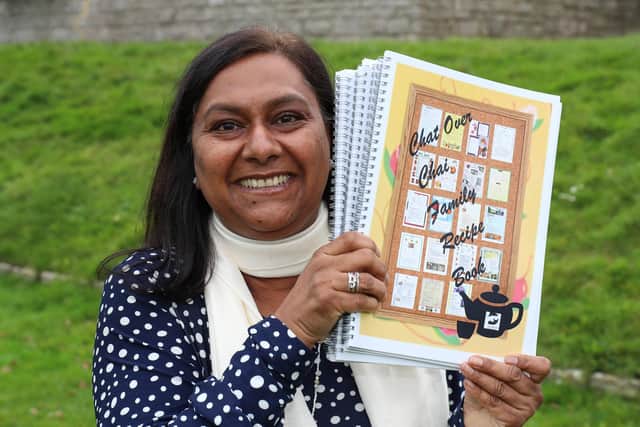 Chat over Chai community group launches their new recipe book. Lucky Haque pictured with copies of the new book. Picture: Stuart Martin (220421-7042)