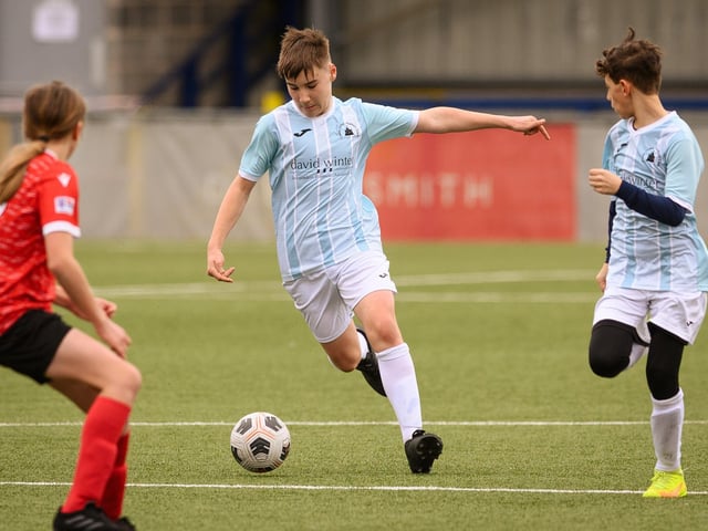 Action from the Portsmouth Youth League Geldard Invitation Cup final between Jubilee 77 U13s and Castle United U13s (light blue and white kit). Picture: Keith Woodland (190321-733)