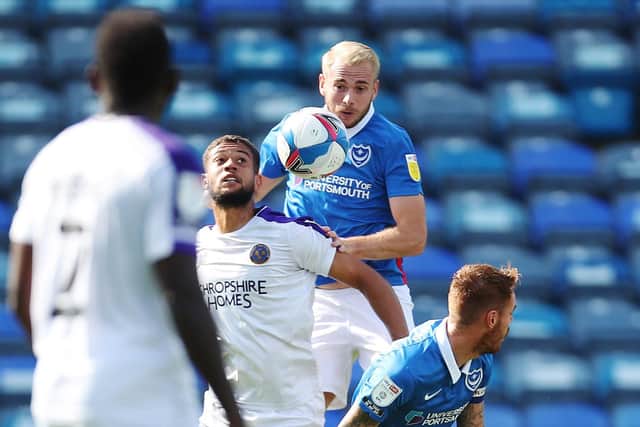 Jack Whatmough made his 100th appearance for Pompey in Saturday's goalless draw against Shrewsbury. Picture: Joe Pepler