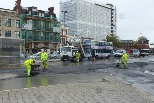 Workers at The Hard Interchange making repairs on October 18, 2019. Picture: Terry Pearson
