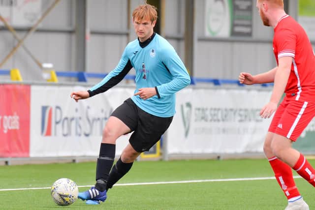 Burrfields striker Jack Palmer, left. Picture: Martyn White.