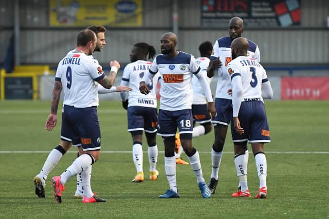 Bedsenté Gomis (18) is congratulated after his equaliser against Eastbourne Borough. Picture: Neil Marshall