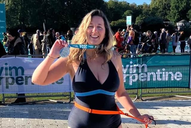 Elise Sargent after swimming the Serpentine Lake in Hyde Park in aid of the Marine Conservation Society, September 2024