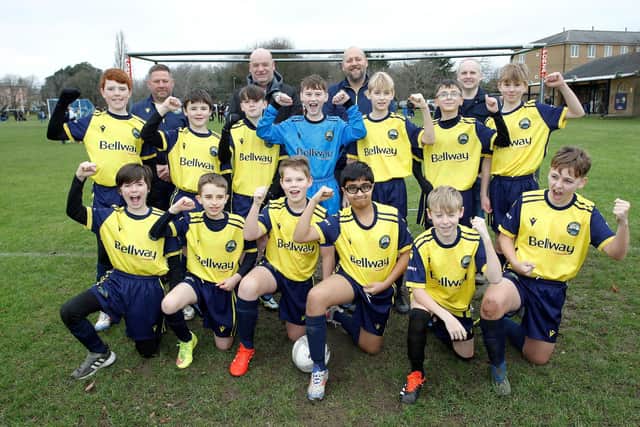 From back left: Simon Watson, Coach; Neal Standley, Club Chairman; David Day, U13 Burgundy Manager; and Graeme Cole, Bellway Wessex’s Sales Director, with the Gosport U13 Burgundy team wearing their new Bellway-sponsored kit