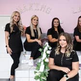 Law graduate Lauren-Ann Lee is happier as a beautician rather than a solicitor. Pictured, front, at her salon, Beauty, in Waterlooville, with from left, Sophie Sadler, Beth Sadler, Morgan Turner, Donna Connis and Diane Simmonds. Picture: Chris Moorhouse   (090920-31)