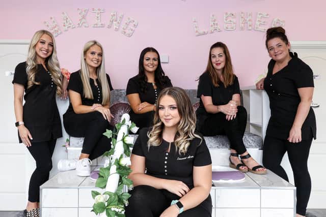 Law graduate Lauren-Ann Lee is happier as a beautician rather than a solicitor. Pictured, front, at her salon, Beauty, in Waterlooville, with from left, Sophie Sadler, Beth Sadler, Morgan Turner, Donna Connis and Diane Simmonds. Picture: Chris Moorhouse   (090920-31)