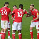 Jayden Stockley, right, celebrates with Chuks Aneke after scoring Charlton's first goal in their 3-1 win against Lincoln.  Picture: Justin Setterfield/Getty Images