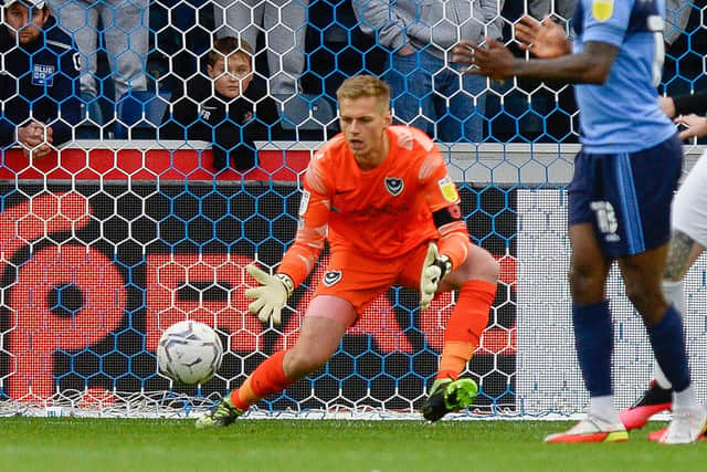 Pompey keeper Alex Bass saved a first-half penalty during yesterday's win at Wycombe.