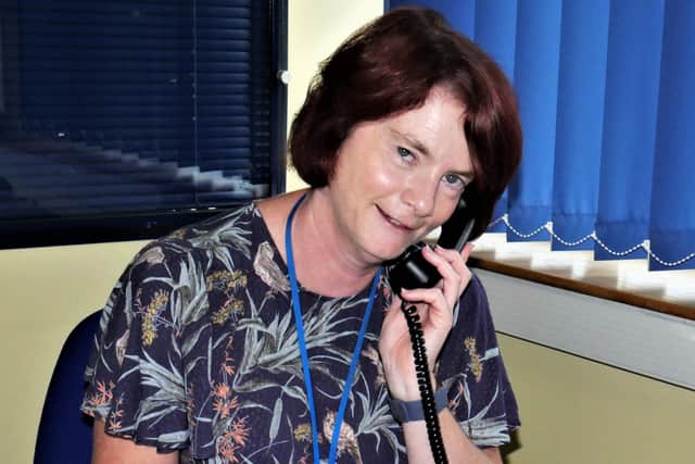 Deafblind UK has extended its helpline hours to support veterans who are deaf or blind. Pictured is one of the charity's workers manning the helpline.