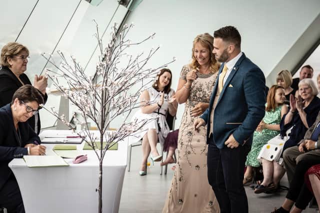 Anthony and Kerrie on their wedding day. Credit: James Anderson at Outside and Instant Photography.