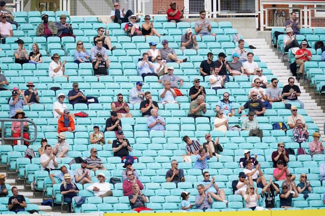 Spectators observing social distancing in the stands during a cricket friendly at the Kia Oval in London last month.