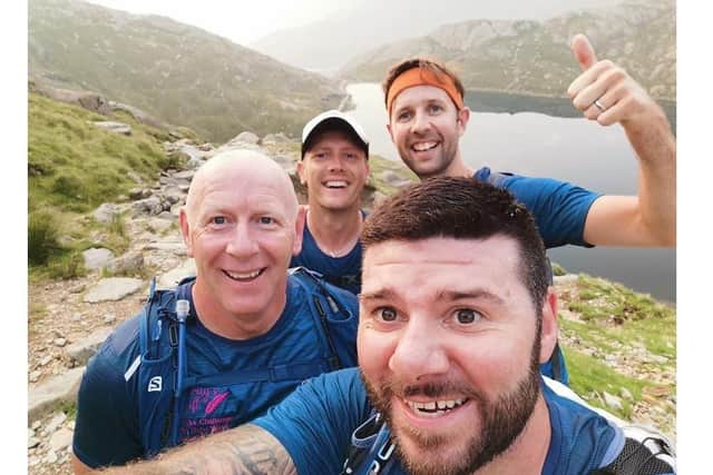 Supporters of Emsworth charity Verity's Gift completed the Three Peaks Challenge by running up each mountain and cycling between them. Pictured: George Turner, Nick Slade, Mike Magill and Philip Robertson