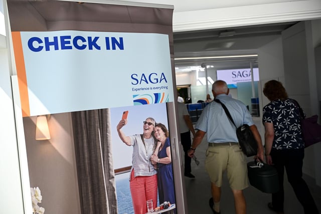 Passengers arrive at the new terminal