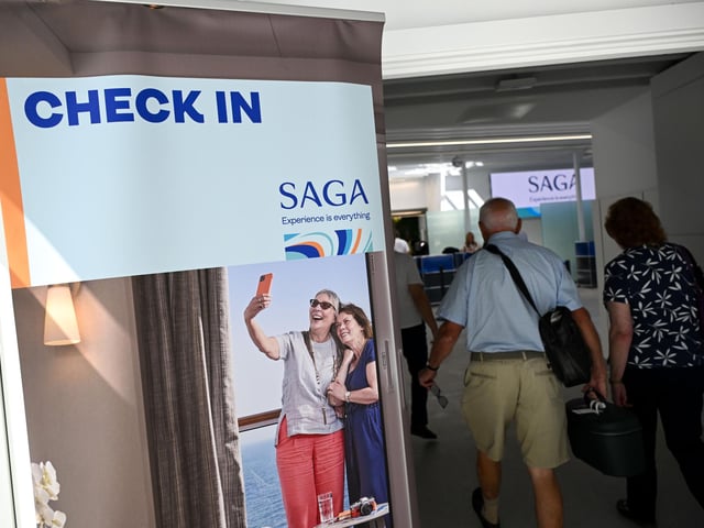Passengers arrive at the new terminal