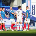 Pompey shake hands after their goalless draw against Shrewsbury on Saturday. Picture: Joe Pepler