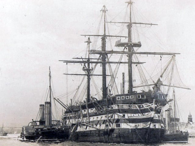 De-masted three decker in Portsmouth Harbour. This marvellous photograph of a Nelsonian/Napolionic wooden wall was loaned to us by William Tofts of Copnor.
